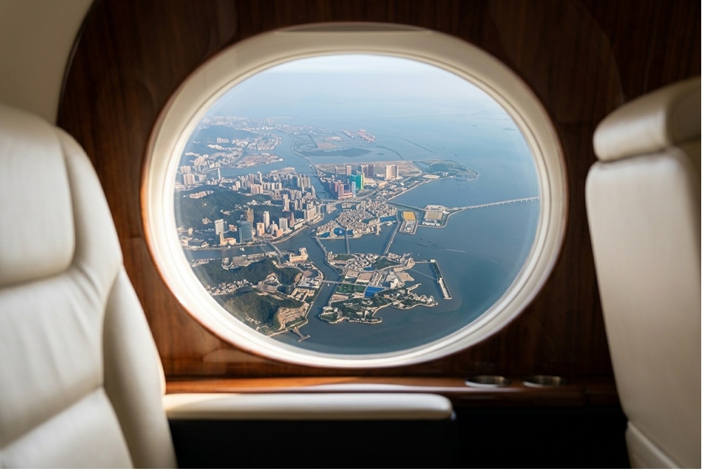 view of Macau and Pearl River from a private jet