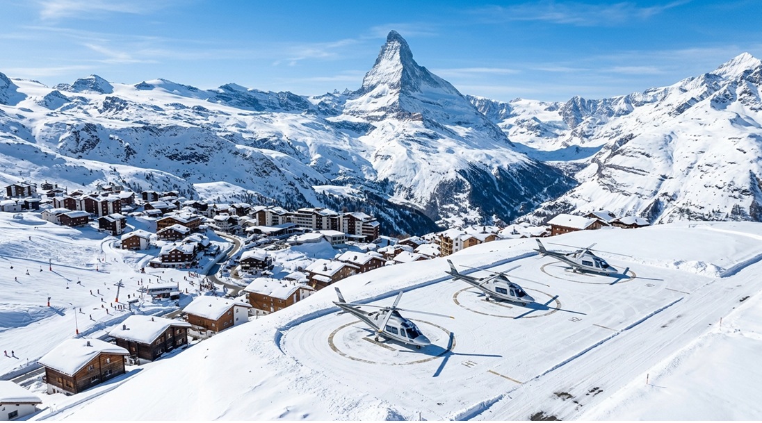 private helicopters on mountain helipads near Zermatt