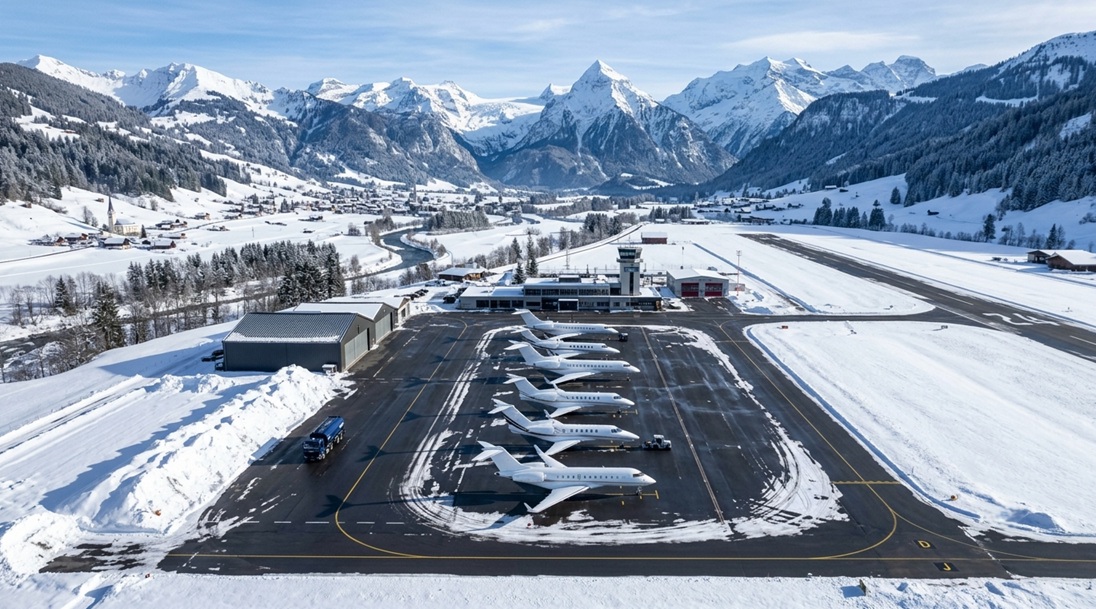 private jets at a snowy alpine airport for Zermatt